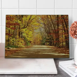 Ambesonne Fall Cutting Board, Scenic View Outdoors Empty Roadway Surrounded with Deciduous Trees Image, Decorative Tempered Glass Cutting and Serving Board, Large Size, Redwood Yellow Orange