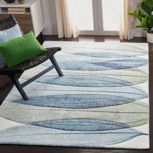 SAFAVIEH Hollywood Collection Area Rug - 6'7" x 9', Ivory & Blue, Mid-Century Modern Design, Non-Shedding & Easy Care, Ideal for High Traffic Areas in Living Room, Bedroom (HLW703A)